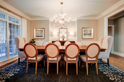 Dining room table seats 10 with no leaf, 12 with one leaf or 14 people with two.