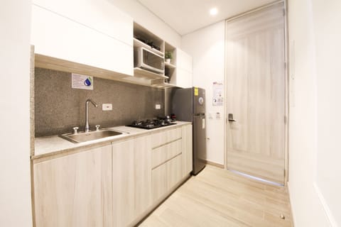 Loft, 2 Bedrooms | Private kitchen | Fridge, microwave, coffee/tea maker, freezer