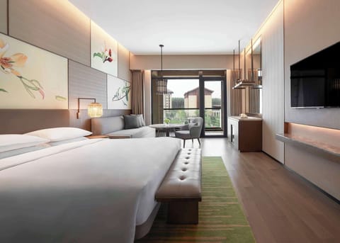 Room, 1 King Bed, Garden View | In-room safe, desk, blackout drapes, iron/ironing board