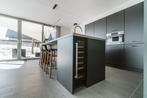 Luxury Bungalow (10 persons) | Private kitchen | Full-size fridge, microwave, oven, stovetop