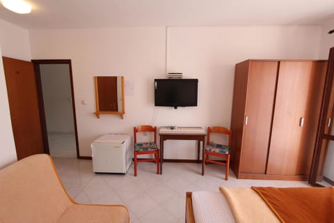 Double Room, Balcony | Living area | Flat-screen TV