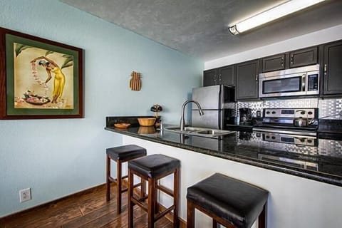 Condo, 1 King Bed (Banyan Tree 404D) | Private kitchen | Fridge, microwave, oven, stovetop