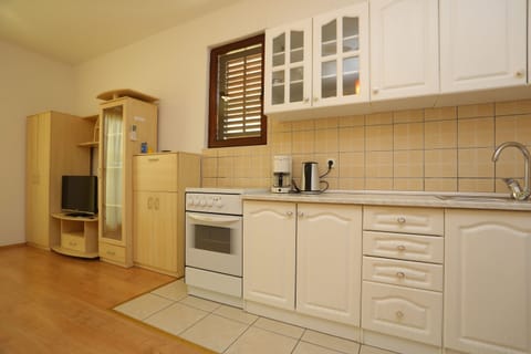 Apartment, 2 Bedrooms (with Sofa Bed) | Private kitchen | Fridge, coffee/tea maker, electric kettle, cookware/dishes/utensils