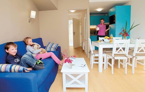 Sink into the cozy sofa after a day exploring the area.