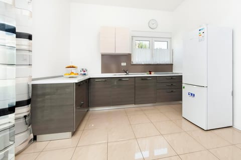 Apartment, Terrace | Private kitchen | Fridge, stovetop, coffee/tea maker, electric kettle