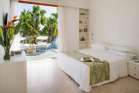 Panoramic Quadruple Room, Terrace, Sea View | Premium bedding, minibar, in-room safe, desk