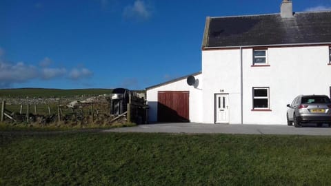 parking at front of cottage
