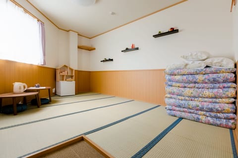 Japanese Style Room, 4 People, Shared Bathroom A | Blackout drapes, free WiFi, bed sheets