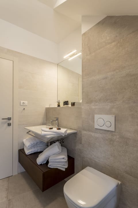 Cosy Loft Room with the View | Bathroom | Designer toiletries, hair dryer, bathrobes, slippers