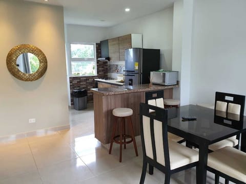 Family Apartment, 2 Bedrooms (Sea Breeze 2) | Living area | Flat-screen TV