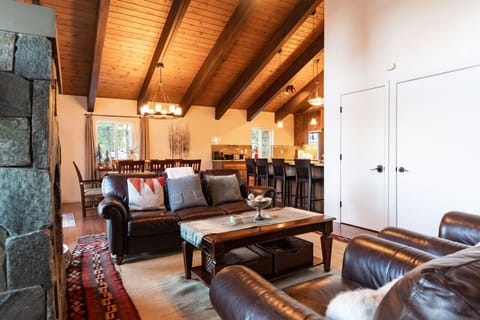 Living room #1 and dining area along with bar seating