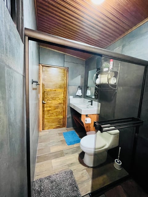 Panoramic Tree House, Garden View | Bathroom | Shower, rainfall showerhead, designer toiletries, hair dryer