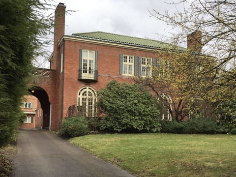 Front view with covered drive thru .