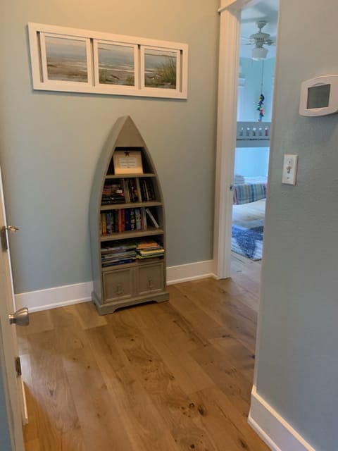 If you like to read, this bookshelf in the upstairs hall has books for all ages.