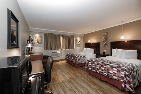 Deluxe Room, 2 Double Beds (Smoke Free) | Desk, laptop workspace, iron/ironing board, rollaway beds