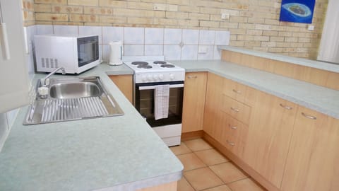 Family Apartment | Private kitchen | Fridge, microwave, coffee/tea maker, cookware/dishes/utensils