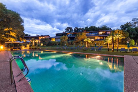Seasonal outdoor pool, pool umbrellas, sun loungers