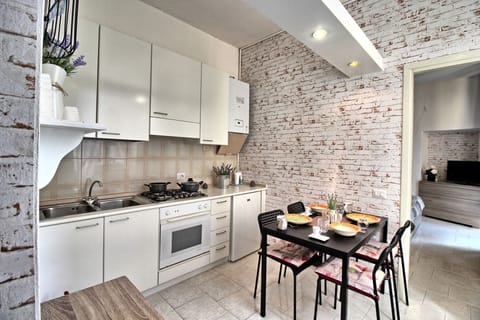 Studio, 1 Bedroom | Private kitchen | Full-size fridge, stovetop, cookware/dishes/utensils
