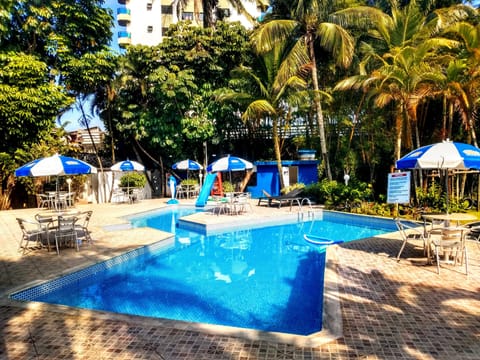 Outdoor pool, pool umbrellas, sun loungers