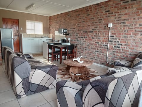 Hanekom Cottage Self-catering | Living area | 32-inch flat-screen TV with satellite channels, TV