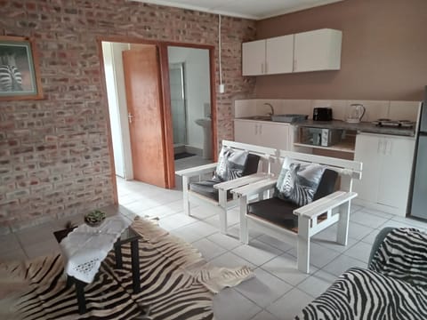 Hanekom Studio Self-catering | Living area | 32-inch flat-screen TV with satellite channels, TV