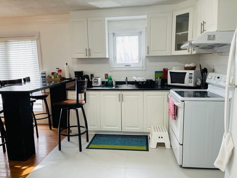 Superior Apartment, Multiple Beds, City View | Private kitchenette | Full-size fridge, microwave, oven, stovetop