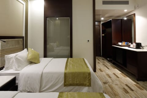 Deluxe Double or Twin Room | 1 bedroom, hypo-allergenic bedding, down comforters, minibar