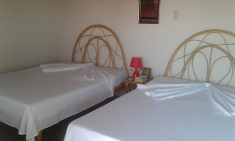 Exclusive Quadruple Room, 2 Queen Beds | 1 bedroom, free WiFi, bed sheets