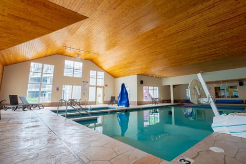 Indoor pool, seasonal outdoor pool, pool umbrellas, sun loungers
