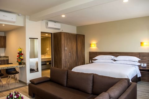 Junior Suite, 1 King Bed, Kitchenette | Premium bedding, minibar, in-room safe, desk