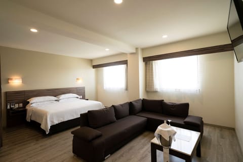 Junior Suite, 1 King Bed, Kitchenette | Premium bedding, minibar, in-room safe, desk
