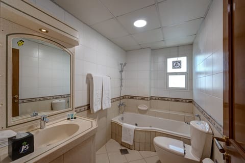 Villa, 4 Bedrooms | Bathroom | Separate tub and shower, free toiletries, bathrobes, towels