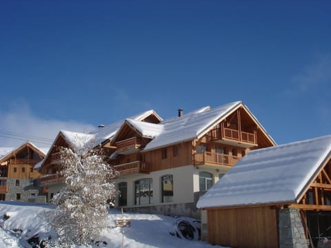 These self-catering ski apartments in La Toussuire are located by the ski lifts, offering ski back to door access.