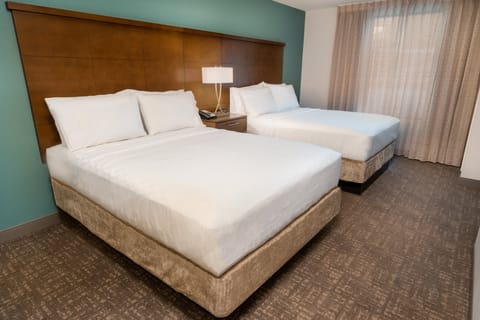 Premium bedding, individually furnished, desk, laptop workspace