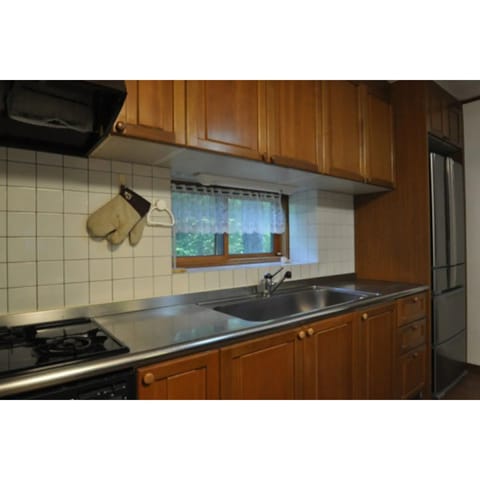 Apartment, 6 Bedrooms | Private kitchen | Fridge, microwave, stovetop, coffee/tea maker