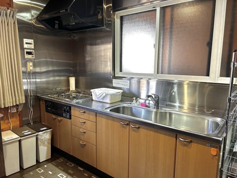 Family Cabin, 2 Bedrooms | Private kitchen | Fridge, microwave, stovetop, coffee/tea maker