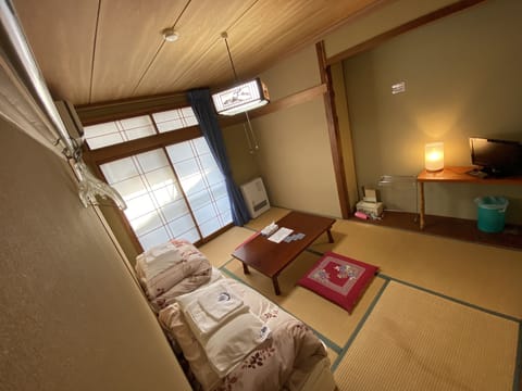 Japanese Style Double Room with Shared Toilet and Shared Bathroom | Free WiFi, bed sheets