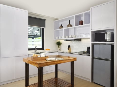 Two Bedroom Apartment Suite | Private kitchen | Full-size fridge, microwave, stovetop, coffee/tea maker