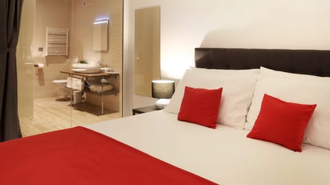 Deluxe Double Room, Balcony | Down comforters, pillowtop beds, soundproofing, iron/ironing board