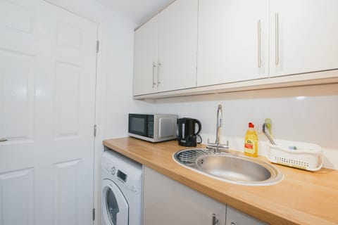 Comfort Room, 1 Double Bed with Sofa bed | Private kitchen | Full-size fridge, microwave, oven, stovetop