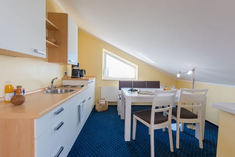 Apartment, 1 Bedroom | Private kitchenette | Coffee/tea maker