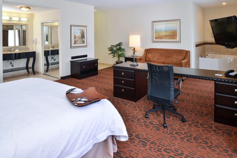 Suite, 1 King Bed, Non Smoking | In-room safe, iron/ironing board, free cribs/infant beds