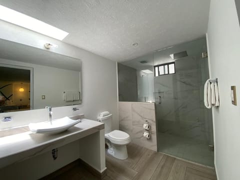 Junior Room, 2 Double Beds | Bathroom | Shower, designer toiletries, hair dryer, towels