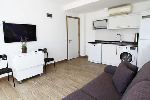 Romantic Apartment, 1 Double Bed with Sofa bed, Sea View | Living area | 43-inch Smart TV with satellite channels, TV