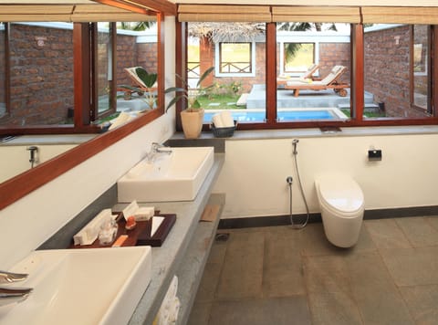 Deluxe Pool Villa | Bathroom | Shower, rainfall showerhead, free toiletries, hair dryer