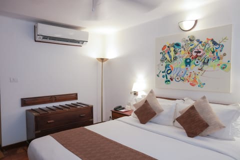 Deluxe Pool Villa | Premium bedding, minibar, in-room safe, individually decorated