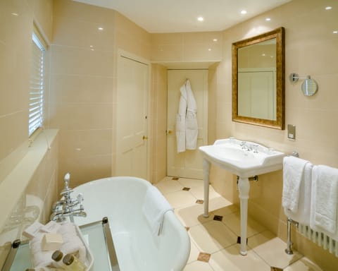 Large Main House Room | Bathroom | Deep soaking tub, free toiletries, hair dryer, bathrobes