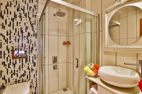 Double Room, City View | Bathroom | Combined shower/tub, rainfall showerhead, hair dryer, bathrobes