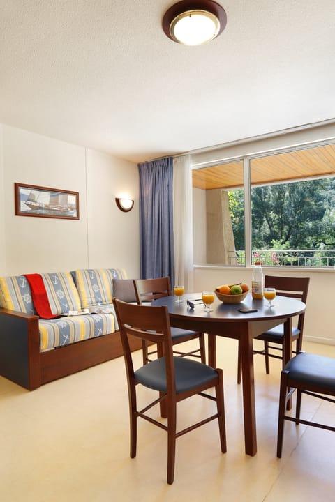 Share meals and laughs at the dining table.