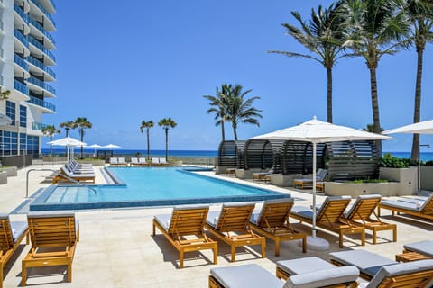 2 outdoor pools, pool umbrellas, sun loungers